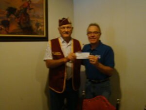 Larry Gunkel accepts $500 from American Ex-POW